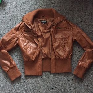 This is a brown polyurethane jacket